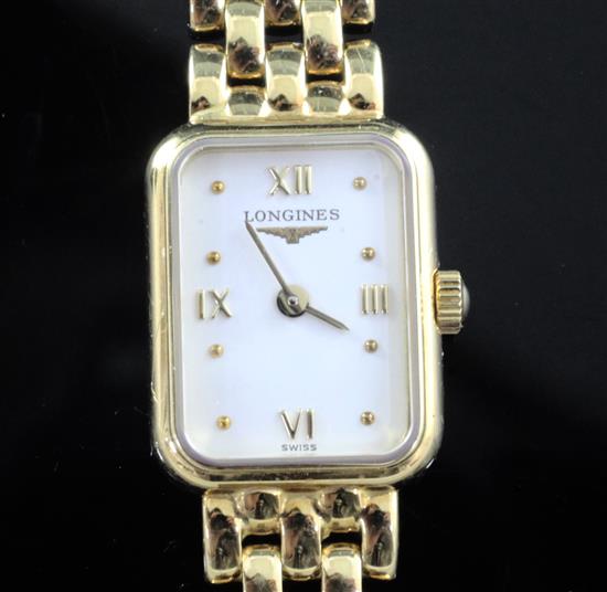A ladys 18ct gold Longines wristwatch on 18ct gold curblink bracelet, with papers, extra links and jewellers box, 30.3g gross.